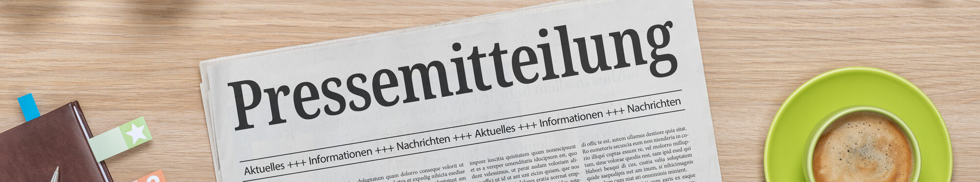 Zeitung mit der Headline Pressemitteilung