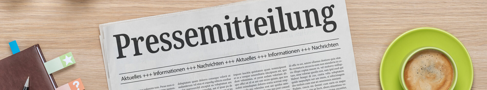 Zeitung mit der Headline Pressemitteilung