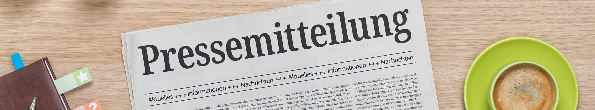 Zeitung mit der Headline Pressemitteilung