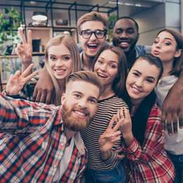 Group of happy cheerful best friends making selfie