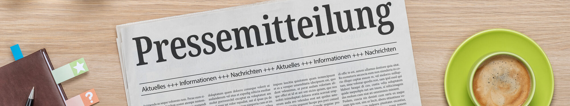 Zeitung mit der Headline Pressemitteilung