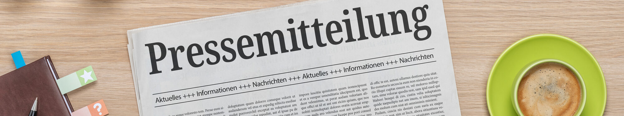 Zeitung mit der Headline Pressemitteilung