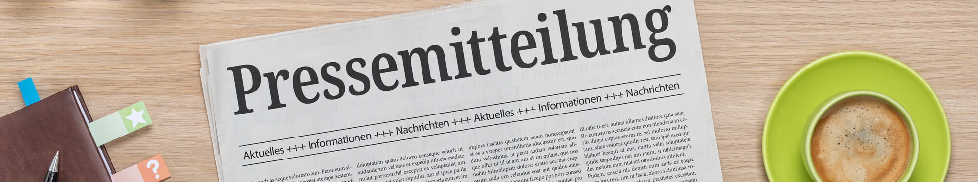 Zeitung mit der Headline Pressemitteilung