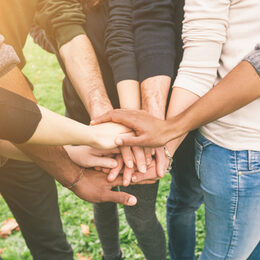 Multiracial Group of Friends with Hands in Stack, Teamwork