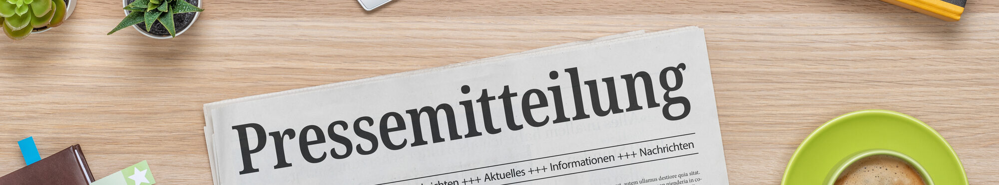 Zeitung mit der Headline Pressemitteilung