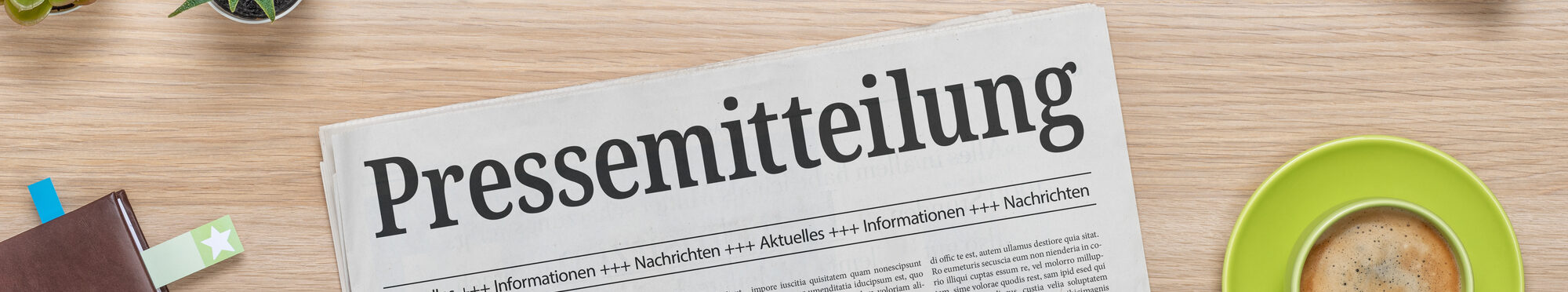 Zeitung mit der Headline Pressemitteilung