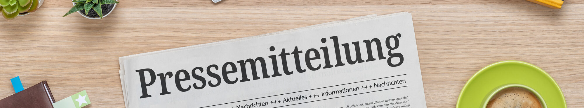Zeitung mit der Headline Pressemitteilung