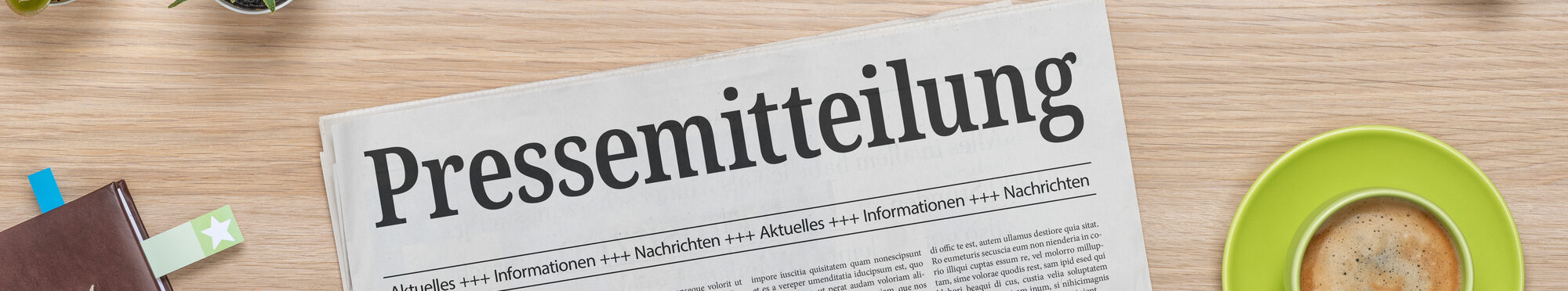 Zeitung mit der Headline Pressemitteilung