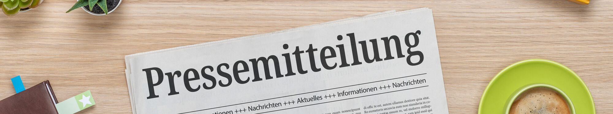 Zeitung mit der Headline Pressemitteilung