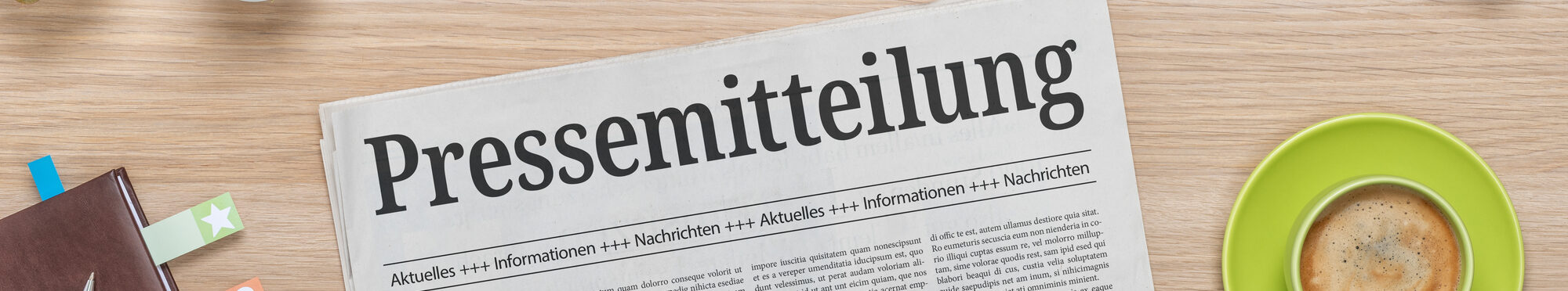 Zeitung mit der Headline Pressemitteilung