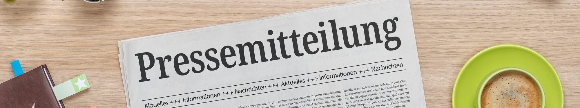 Zeitung mit der Headline Pressemitteilung