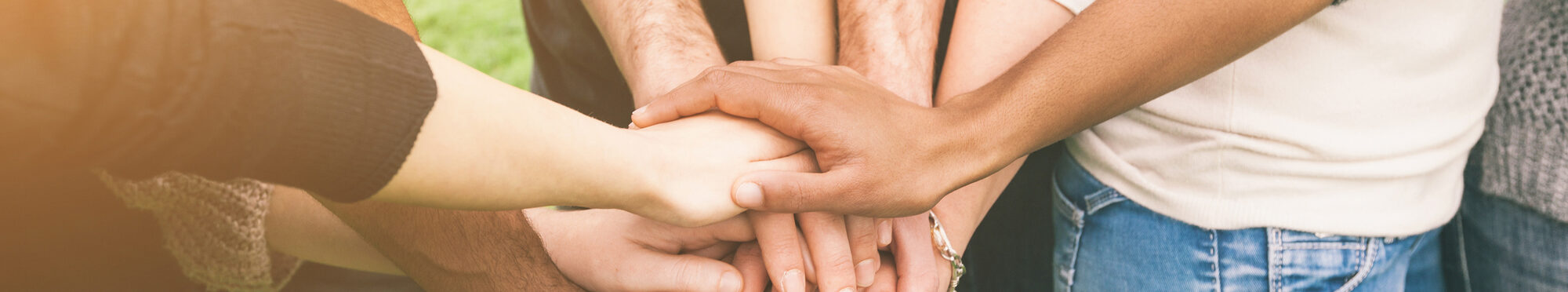 Multiracial Group of Friends with Hands in Stack, Teamwork