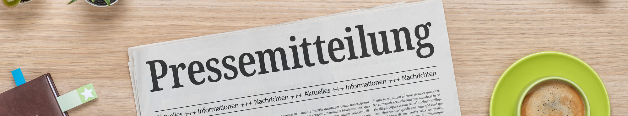 Zeitung mit der Headline Pressemitteilung