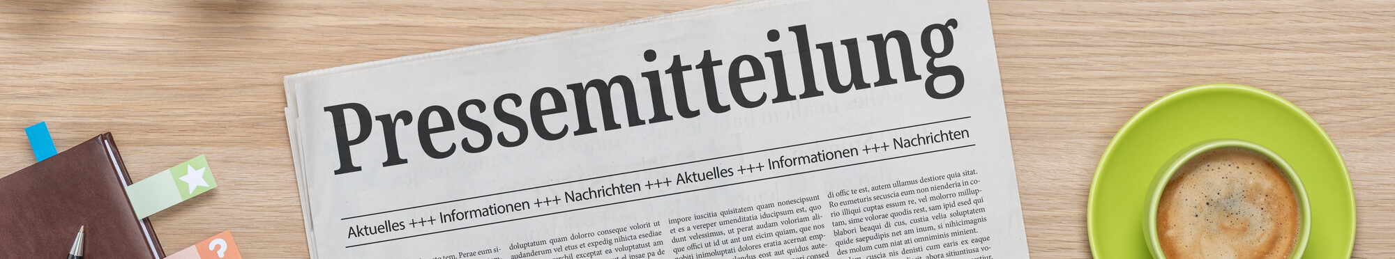 Zeitung mit der Headline Pressemitteilung