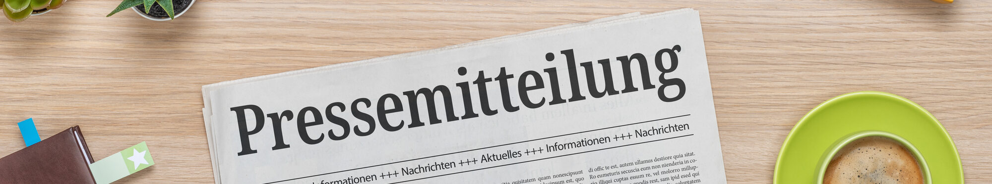 Zeitung mit der Headline Pressemitteilung