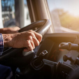 Truck driver keeps driving with one hands and change gears,The m