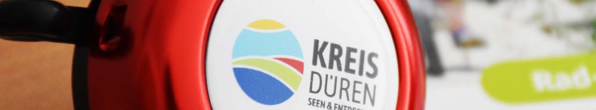 Klingel mit Kreis Düren Logo, nah