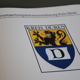 Titelbild mit Wappen der Verantwortungskettenvereinbarung