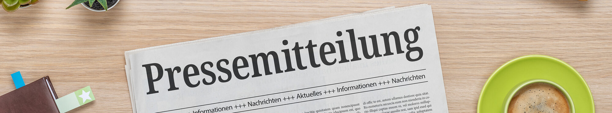 Zeitung mit der Headline Pressemitteilung