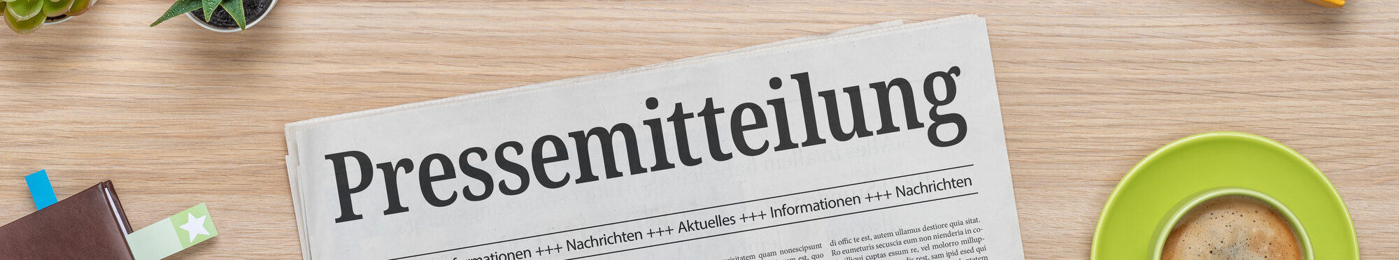 Zeitung mit der Headline Pressemitteilung