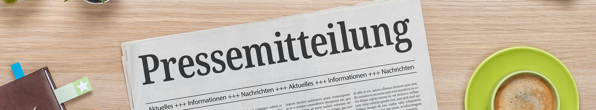 Zeitung mit der Headline Pressemitteilung