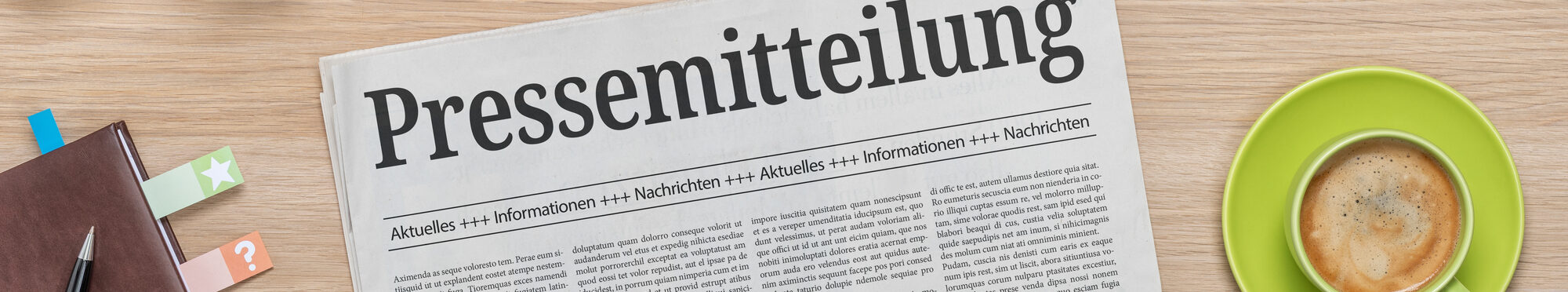 Zeitung mit der Headline Pressemitteilung