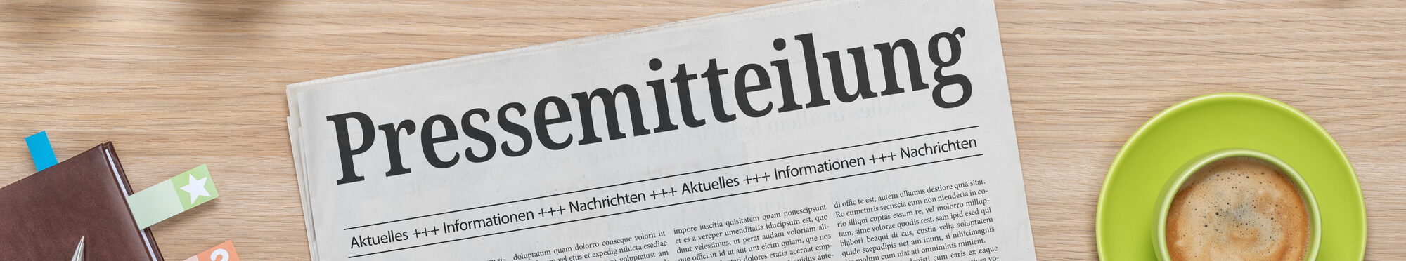 Zeitung mit der Headline Pressemitteilung