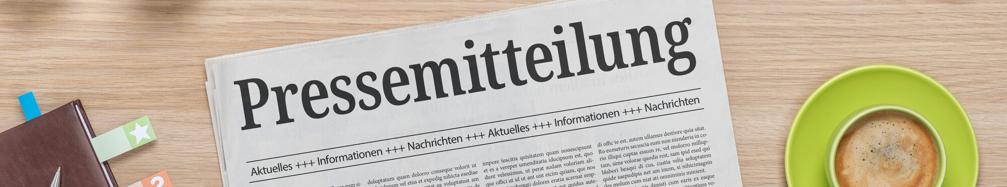 Zeitung mit der Headline Pressemitteilung