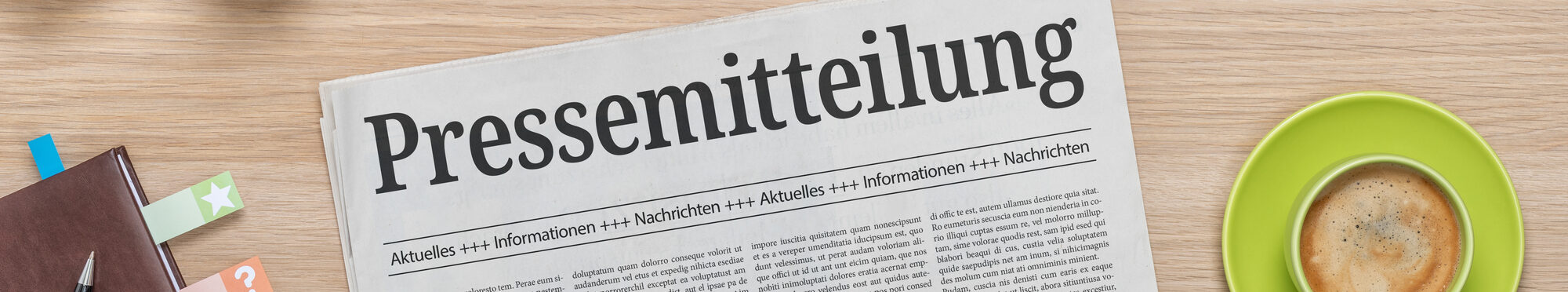 Zeitung mit der Headline Pressemitteilung