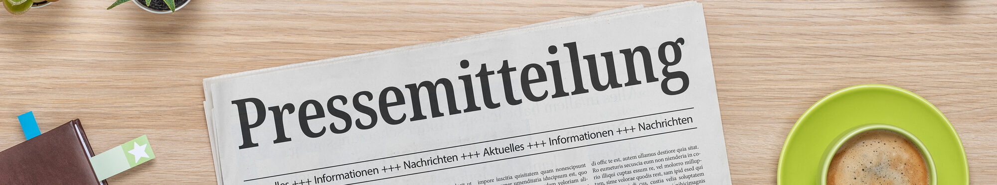 Zeitung mit der Headline Pressemitteilung