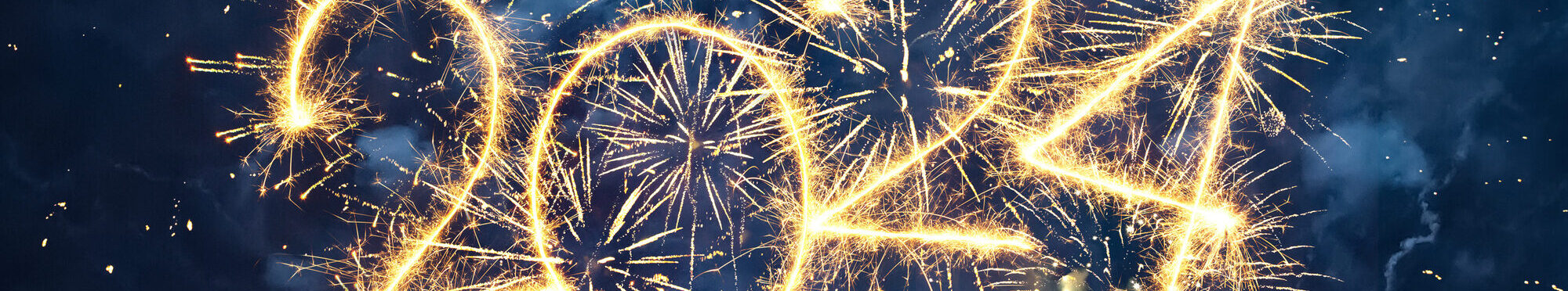 Beautiful Blue Holiday background with sparks from fireworks
