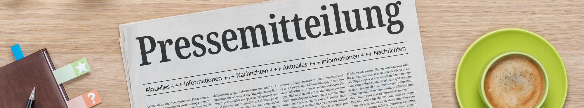 Zeitung mit der Headline Pressemitteilung